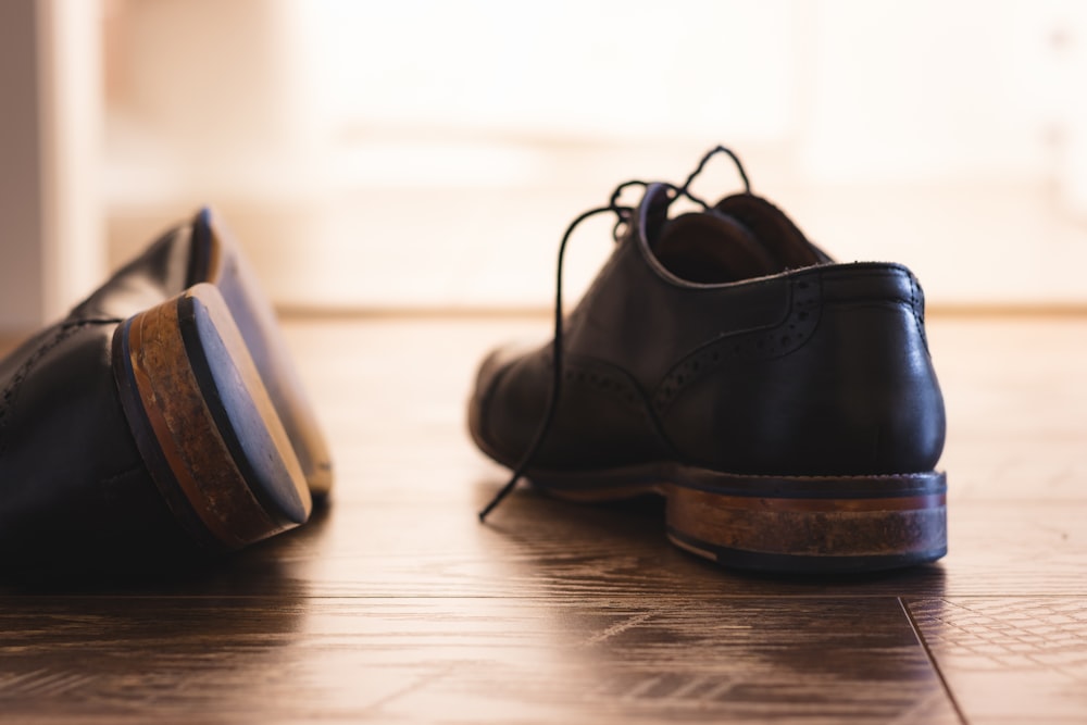 pair of black leather shoes