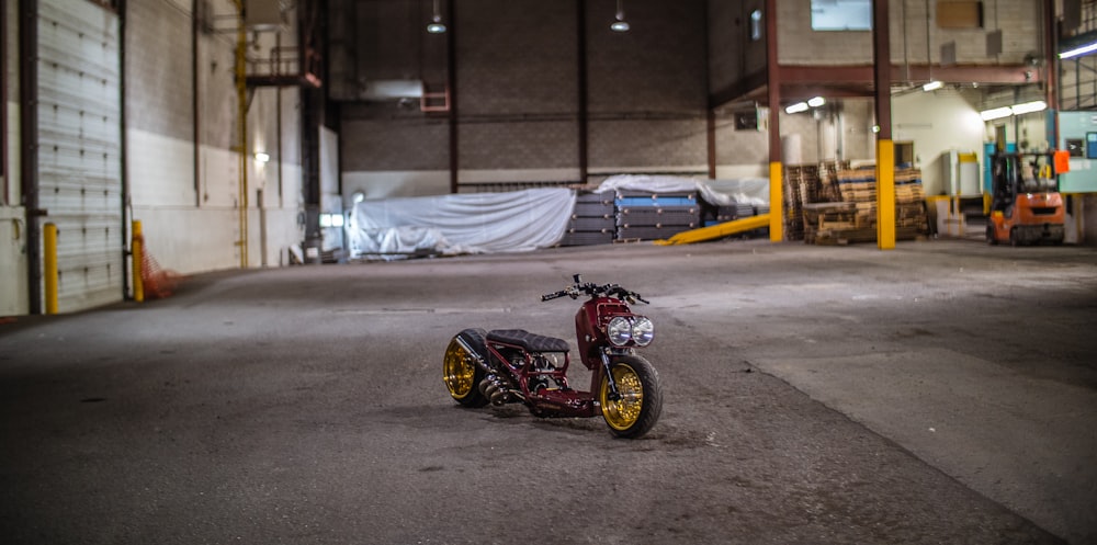 black and brown motorcycle parked in garage