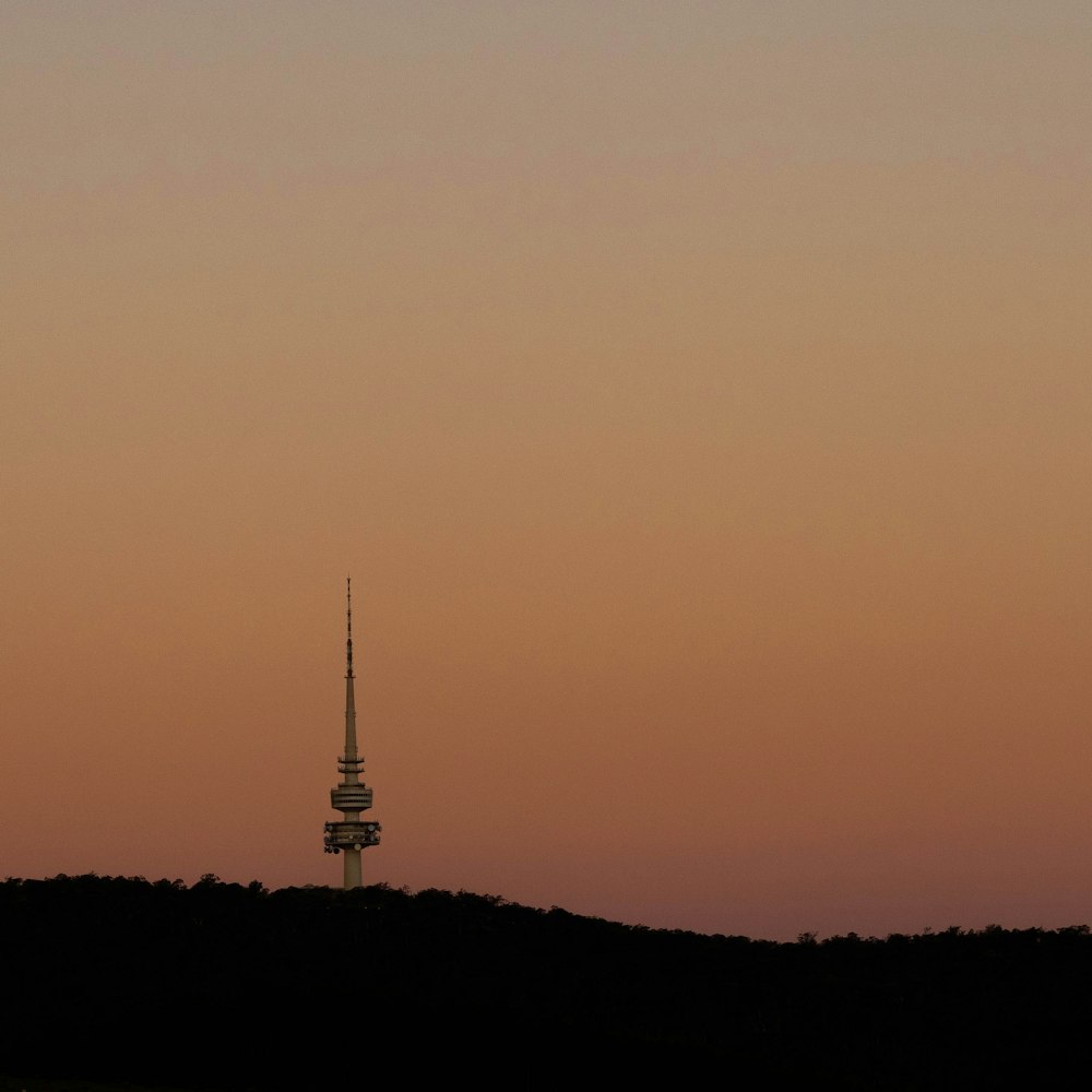 gray concrete tower during golden hour