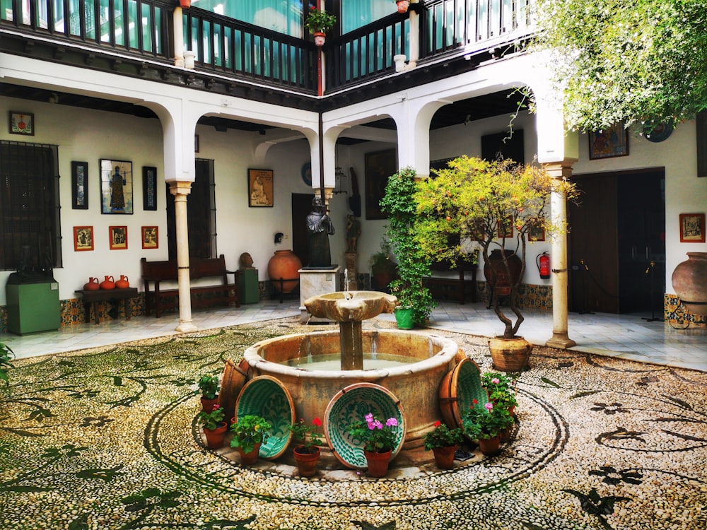 brown concrete water fountain during daytime