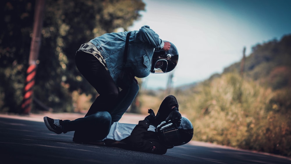 shallow focus photo of person wearing full-face motorcycle helmet