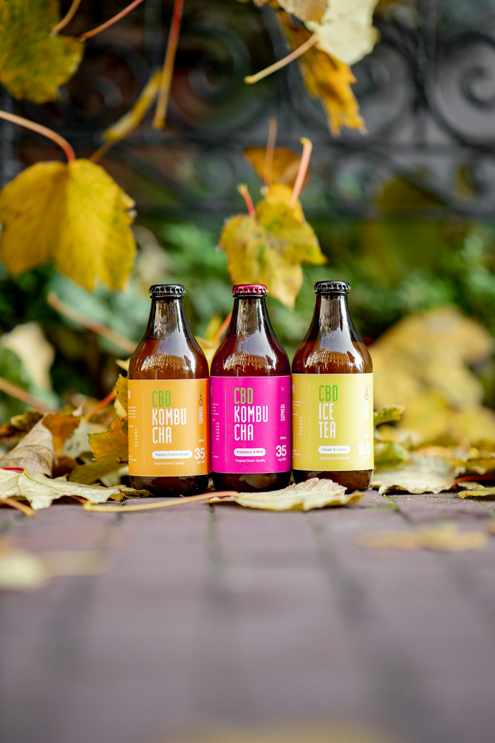 three amber glass bottles