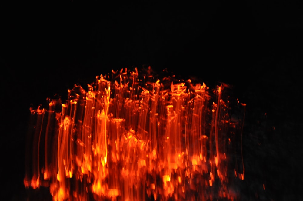 a close up of a fire in the dark