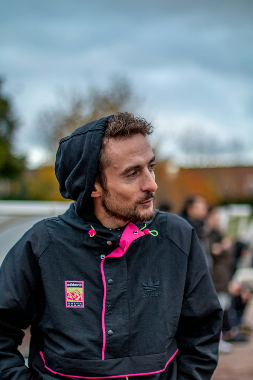 man wearing black button-up jacket