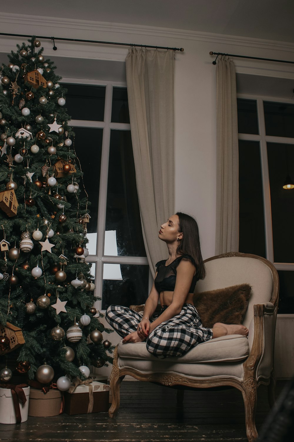 woman sitting on chair]