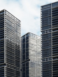 high-rise buildings under white and blue sky