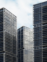 high-rise buildings under white and blue sky