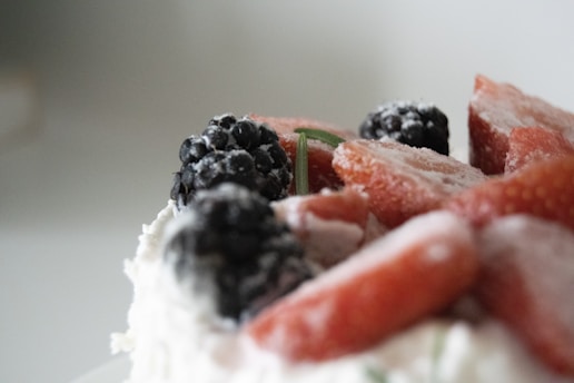 A close-up of a delicious Kinako powder dessert topped with fresh fruit and a sprinkle of toasted soy flour.