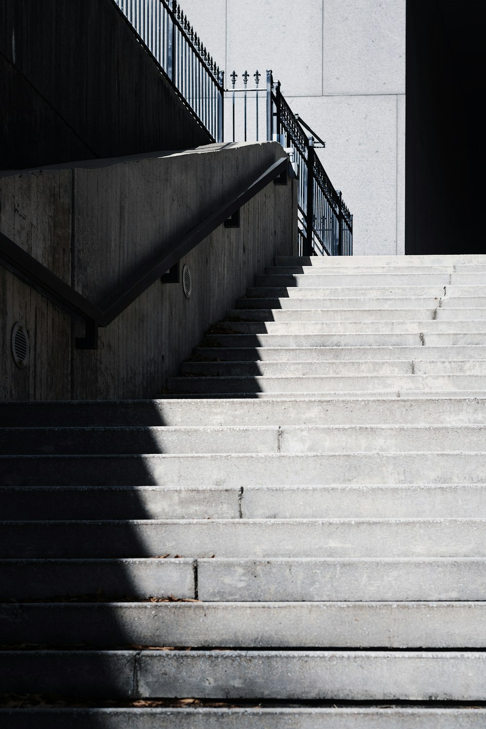 white concrete building viewing stairs