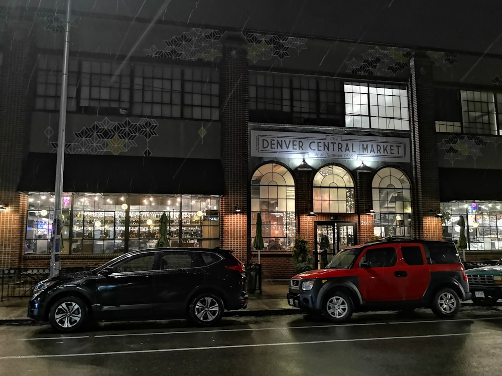 cars parked in front of Denver Central Market building