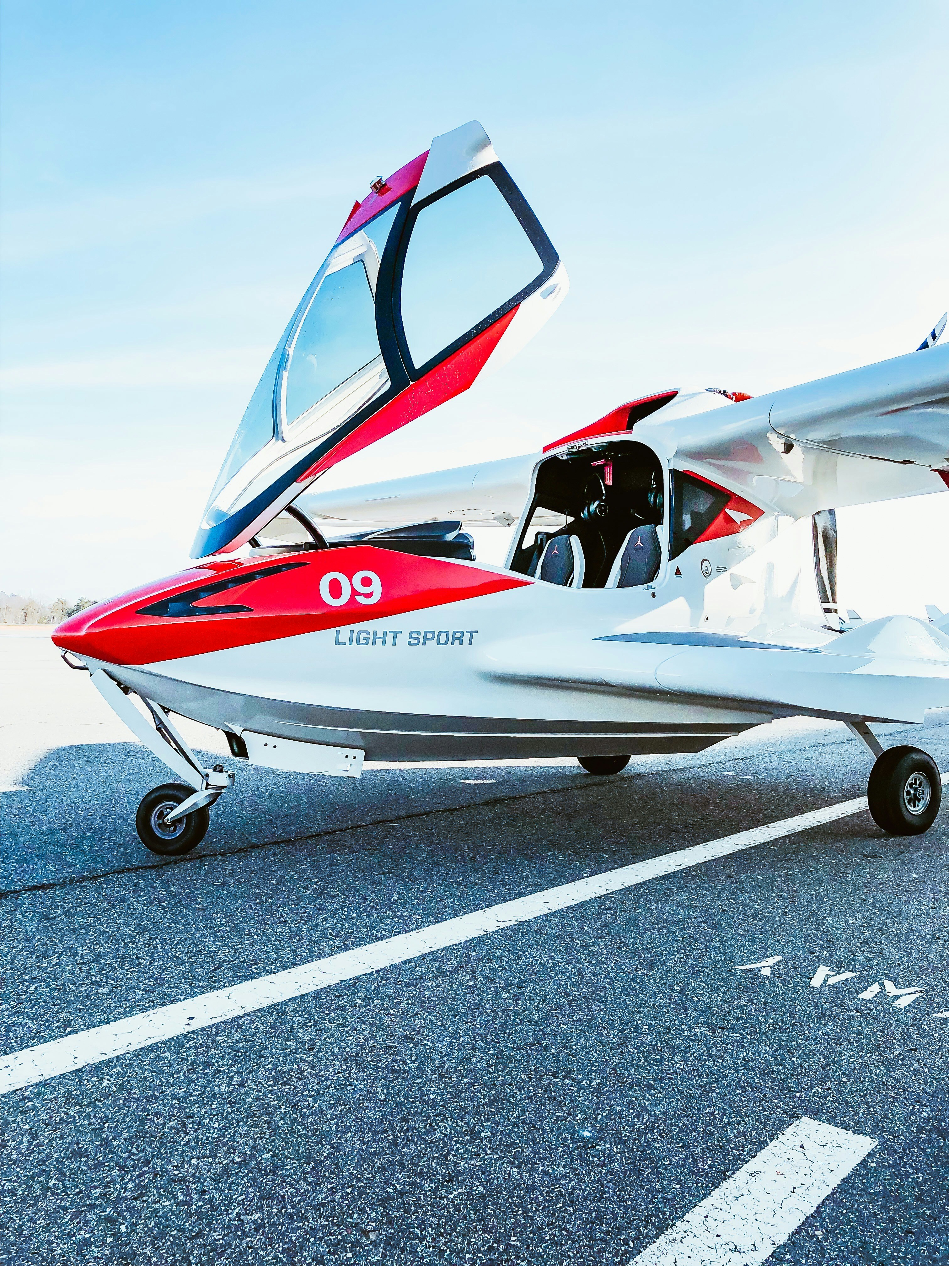 white and red airplane