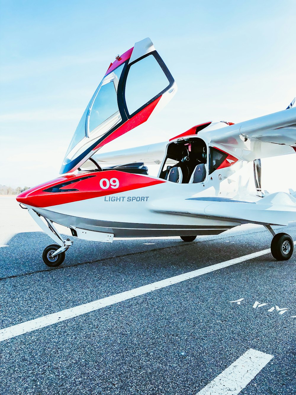 white and red airplane