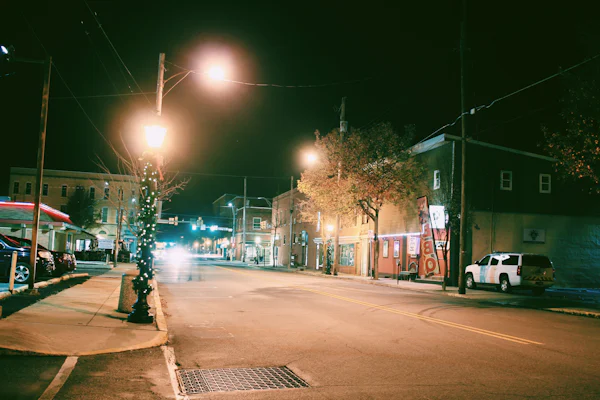 Car parking near a building representing a growing neighborhood in Lytle Texas