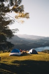 set-up tents near body of water
