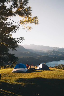 set-up tents near body of water