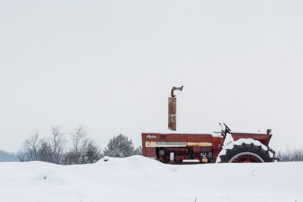 tractor near trees during daytime