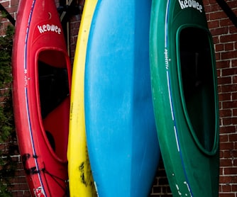 assorted-color kayak on display