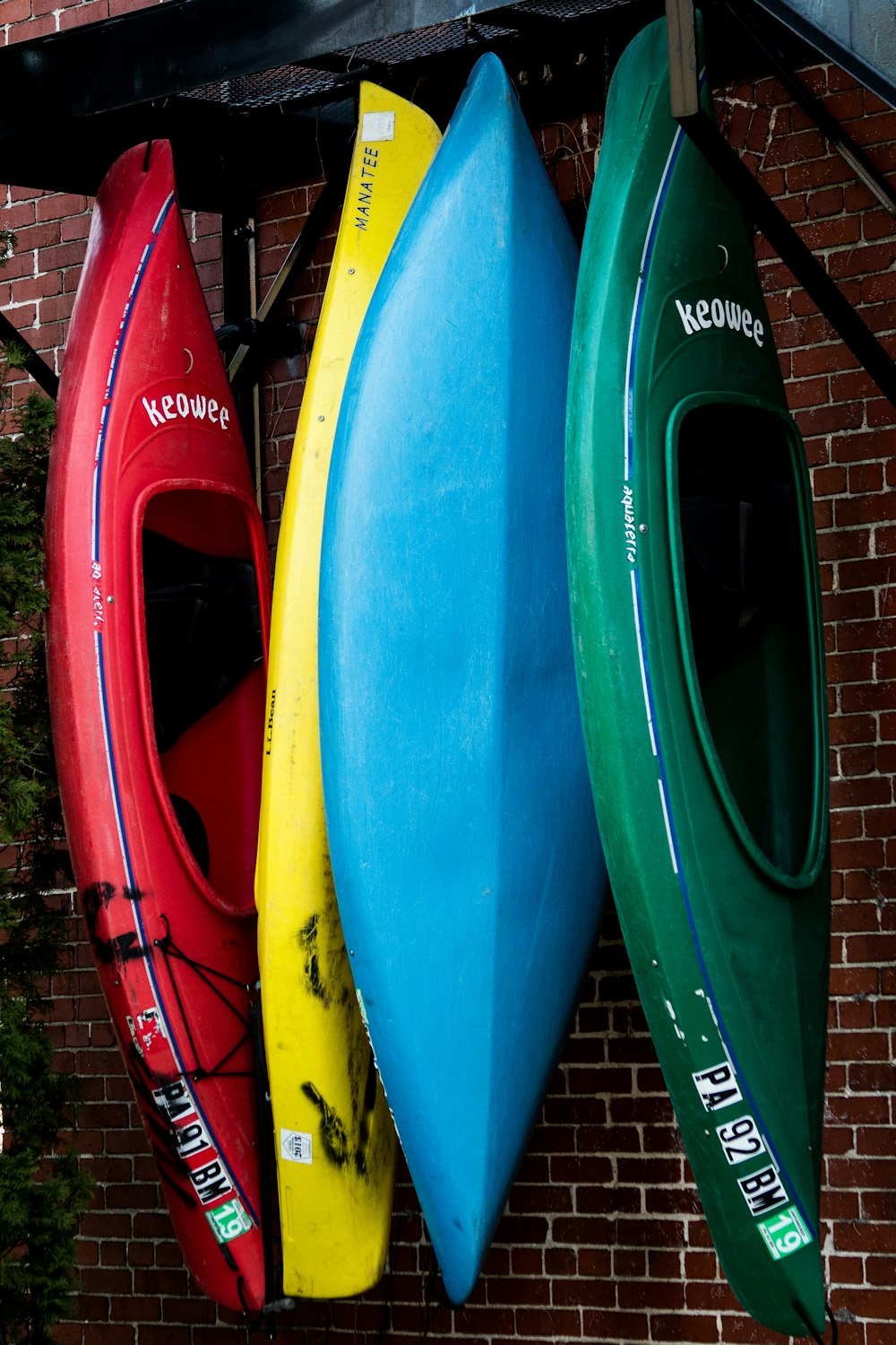 assorted-color kayak on display