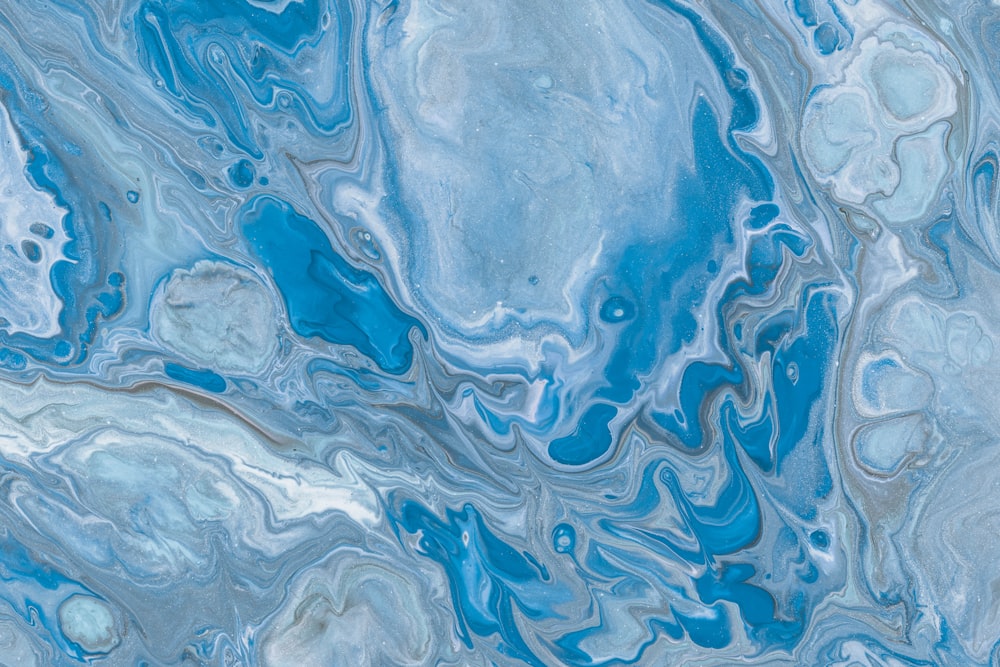 a blue and white marble background