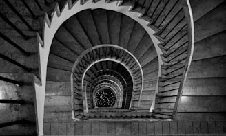 grayscale photography of black and white staircase
