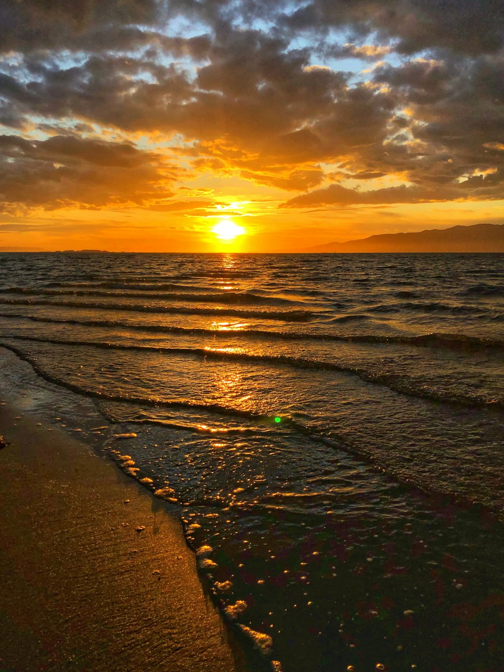 shoreline and body of water during golden hour