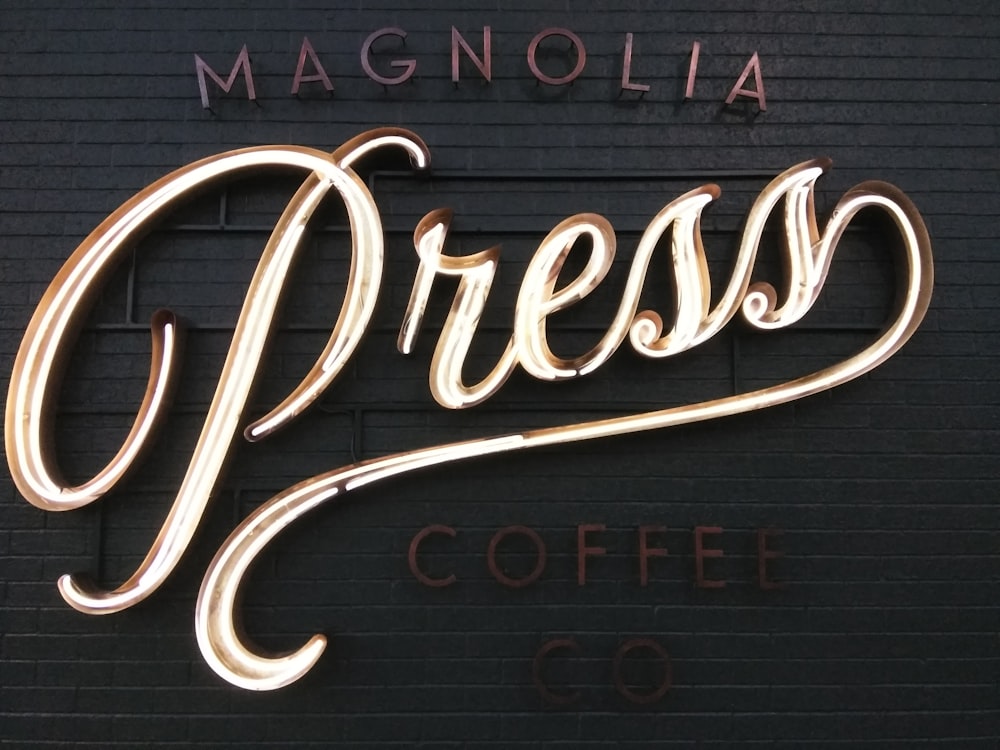 Letrero de Magnolia Coffee Press