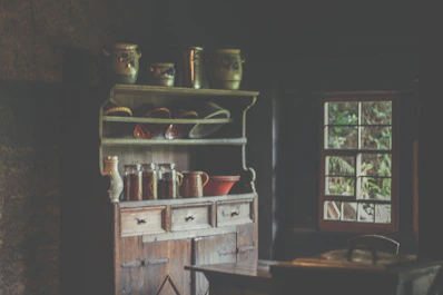 Charming kitchen with rustic wooden cabinets and modern appliances.