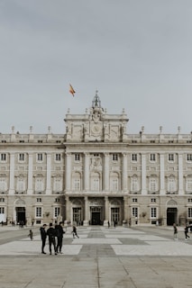 people walking near Royal Palace of Madrid