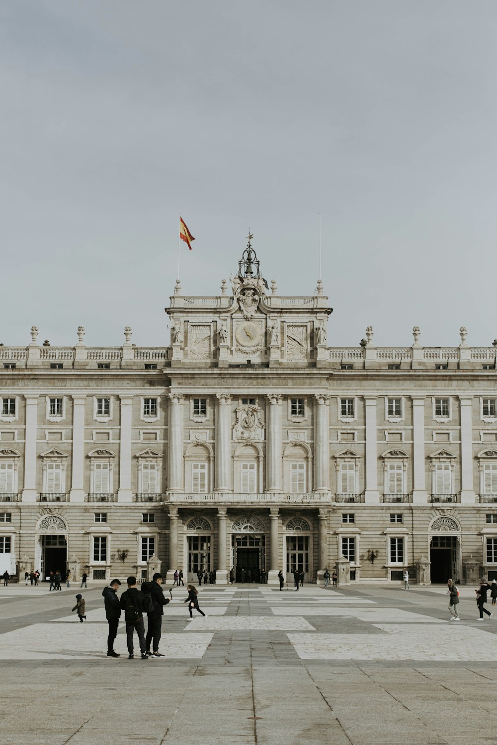 people walking near Royal Palace of Madrid