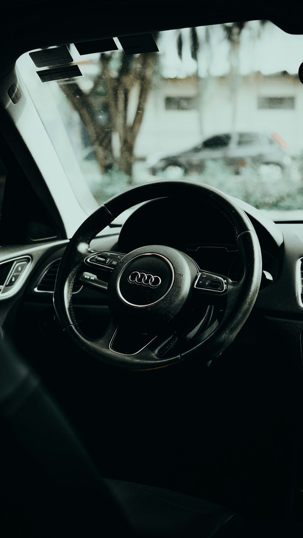 black Audi steering wheel