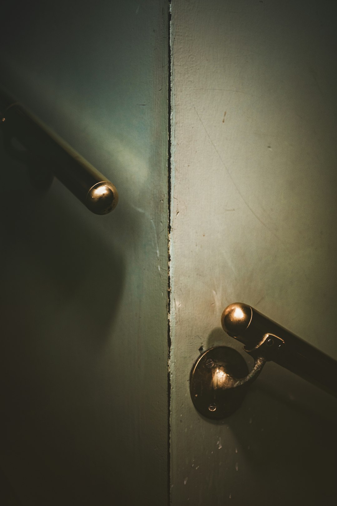 macro photography of brass handlebar