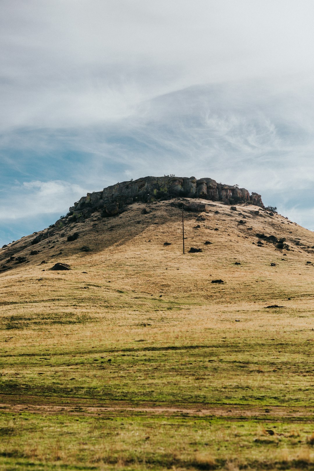 mountain under white clouds