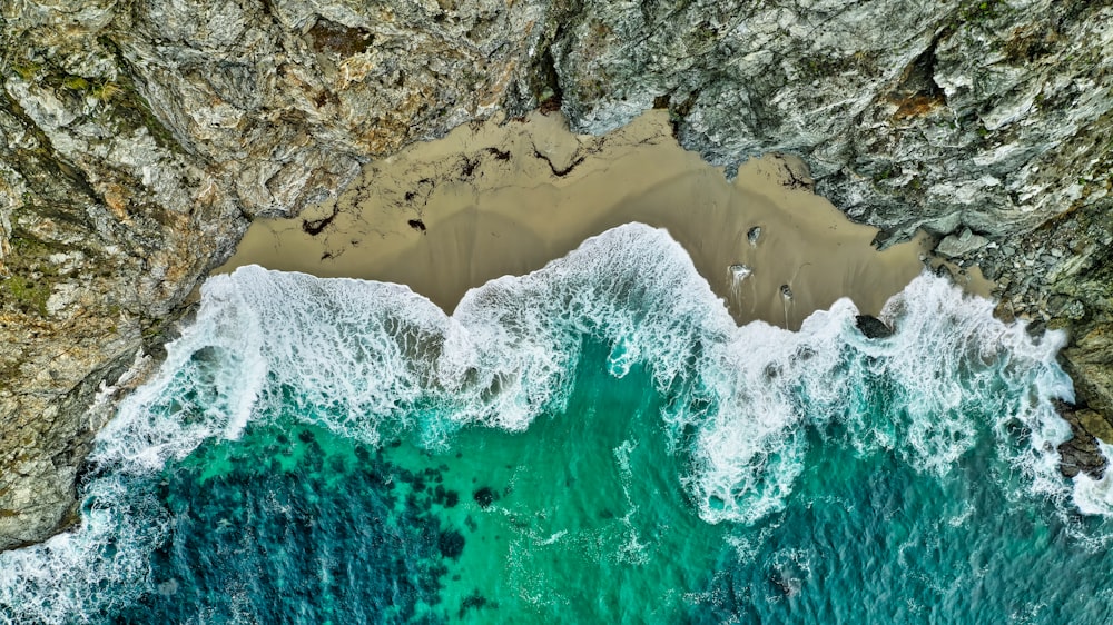 aerial view of sea bubbles on shore