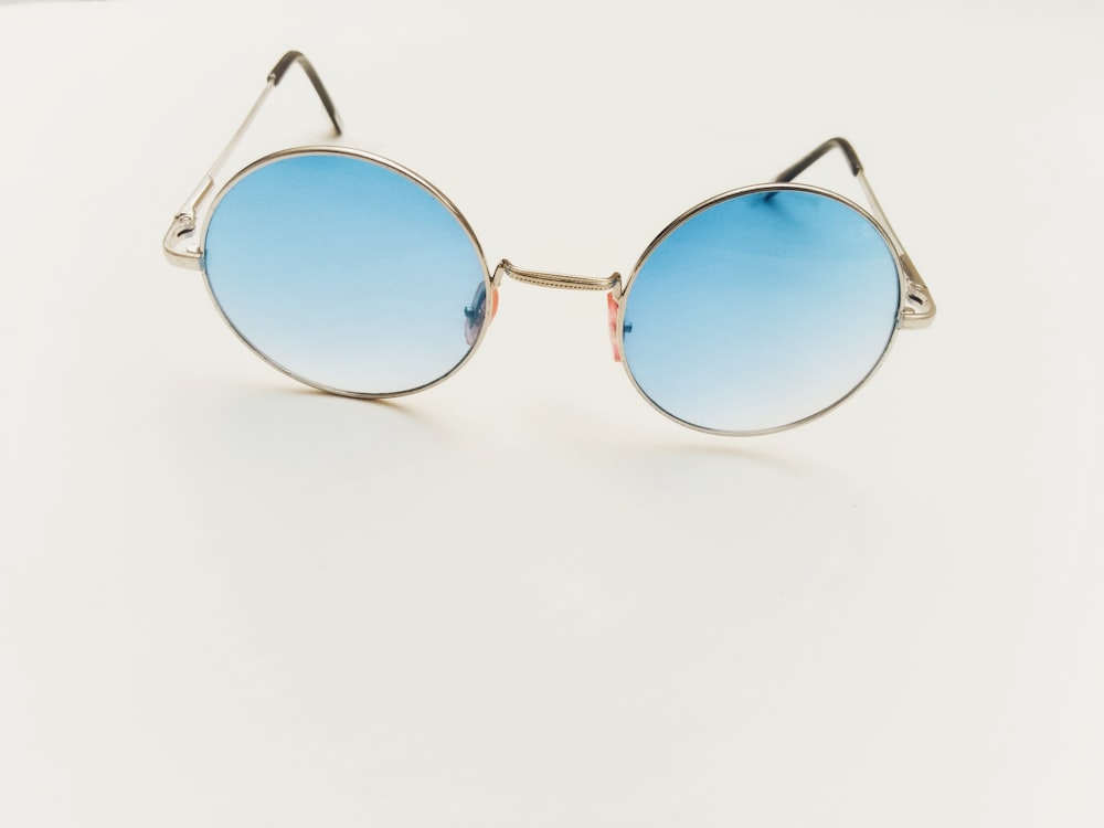 gold-framed hippie sunglasses