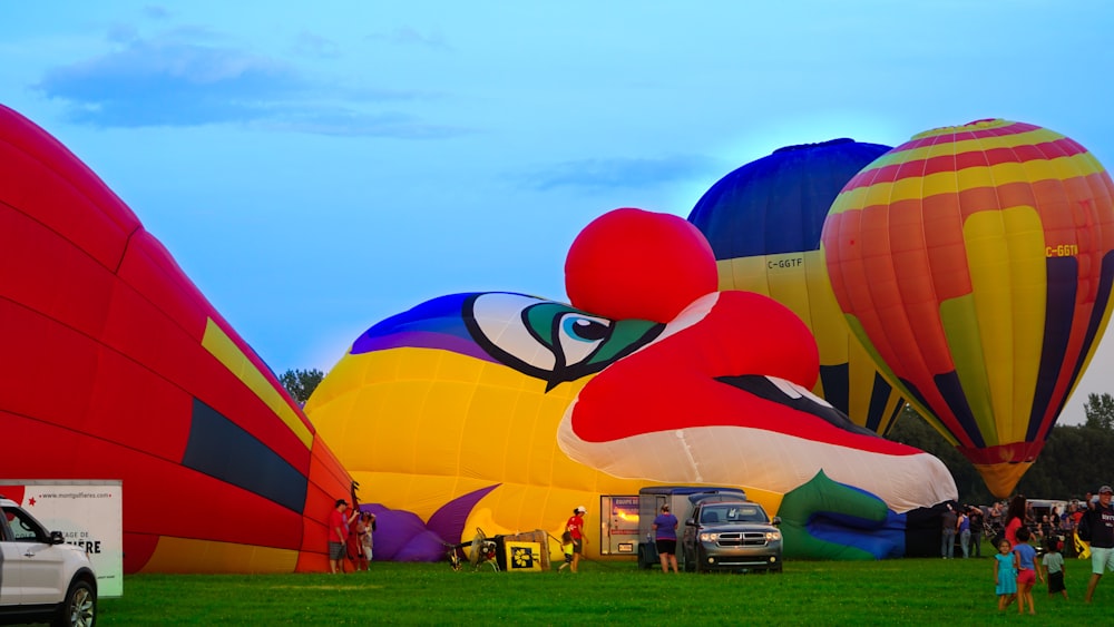 hot air balloon at field during daytime