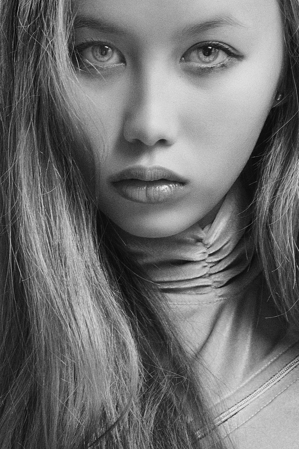 grayscale photography of woman wearing turtleneck top