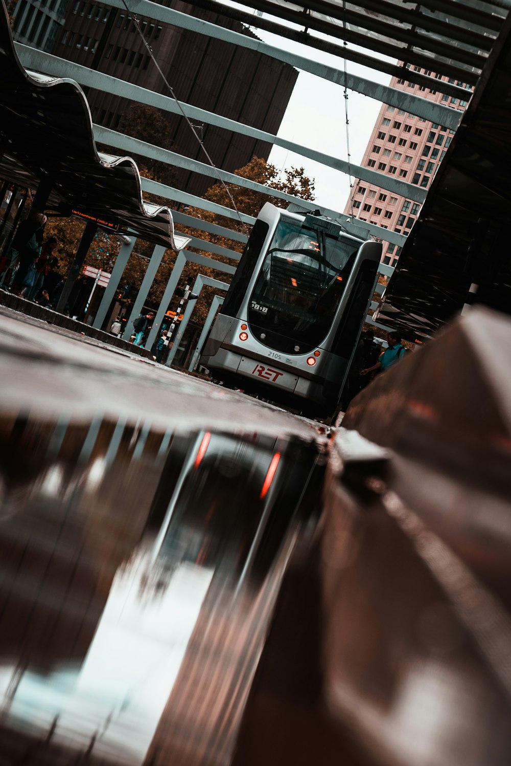 gray and black train on station