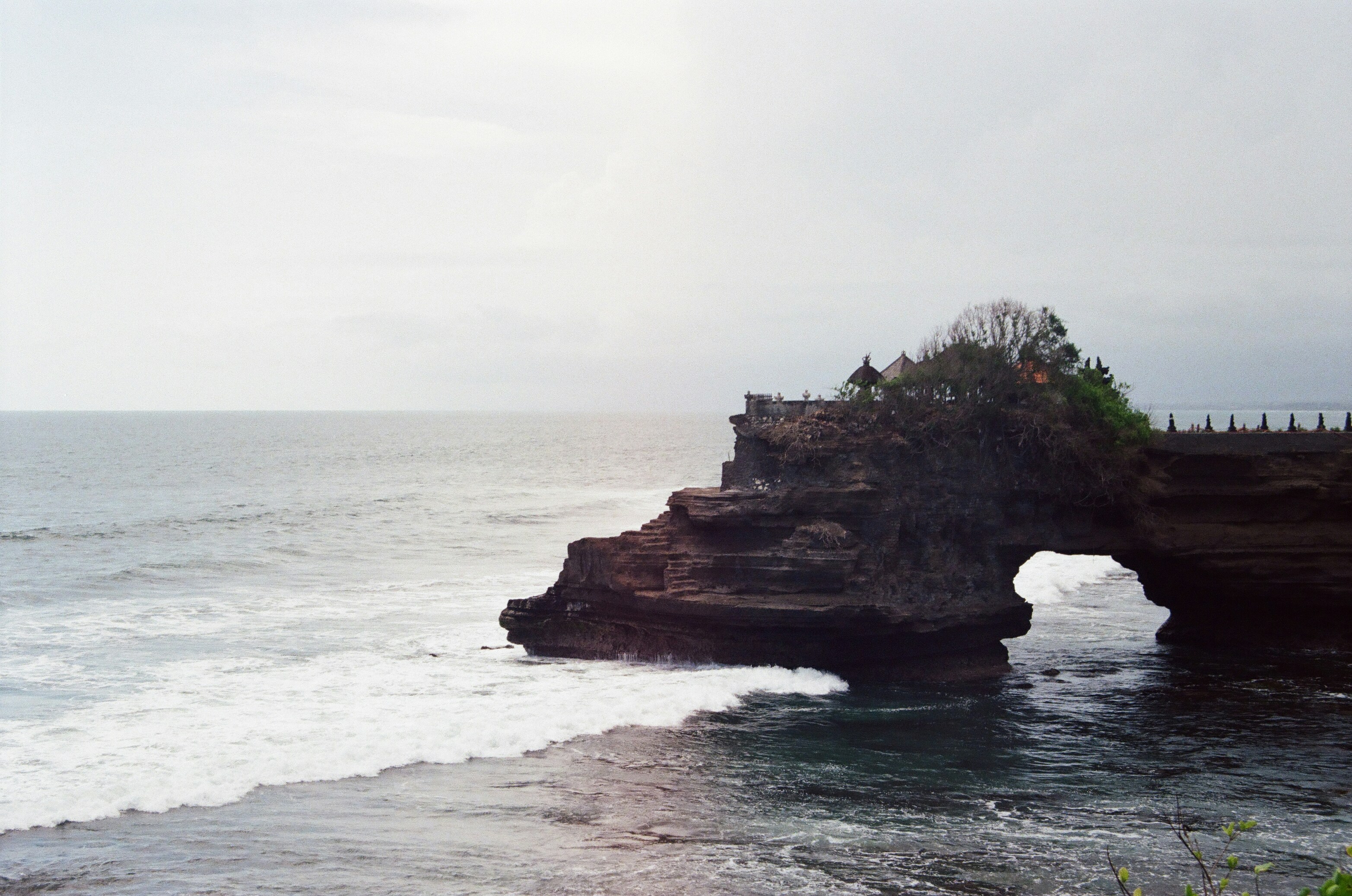 View photography of island in seashore