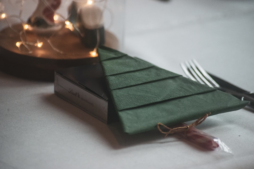 green textile on white box