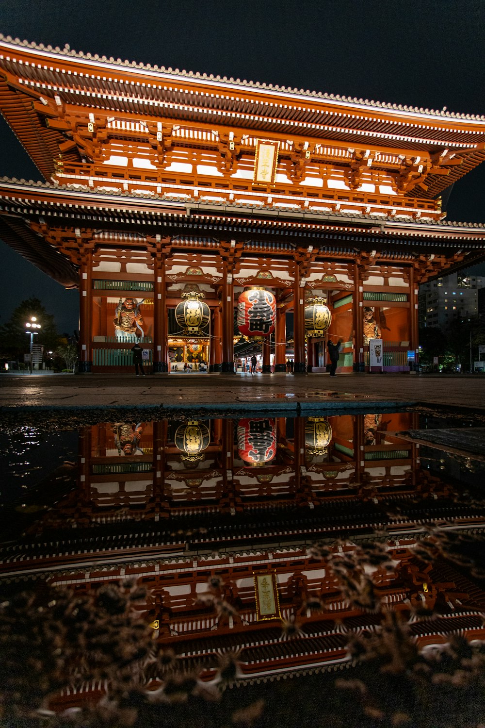 lighted brown structure at night