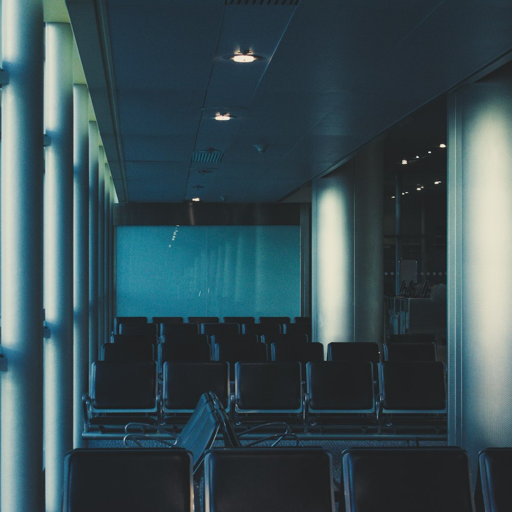 empty black chairs inside building