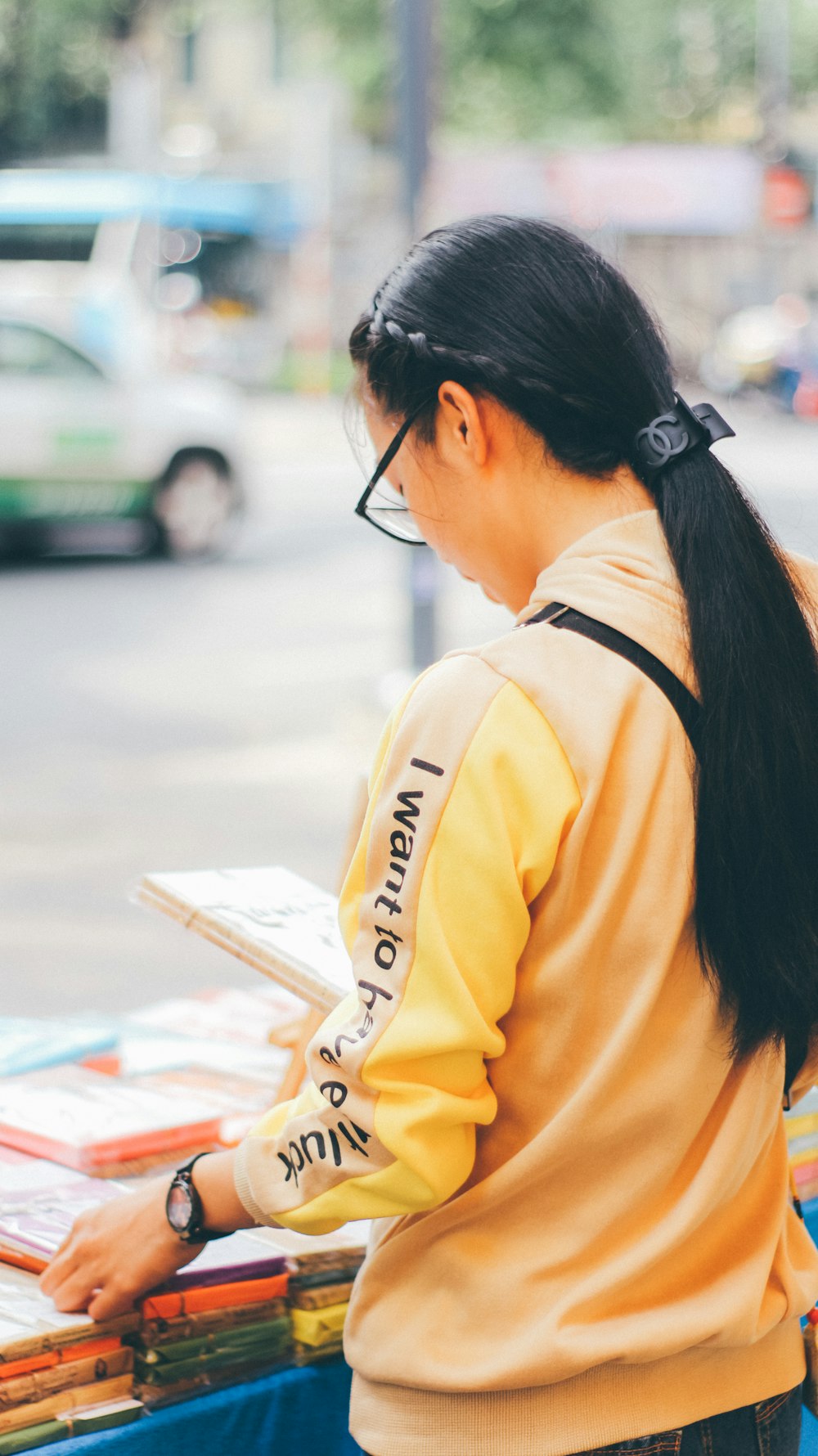 woman wearing yellow sweater