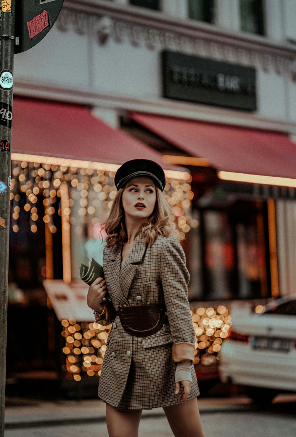 woman walking near vehicle