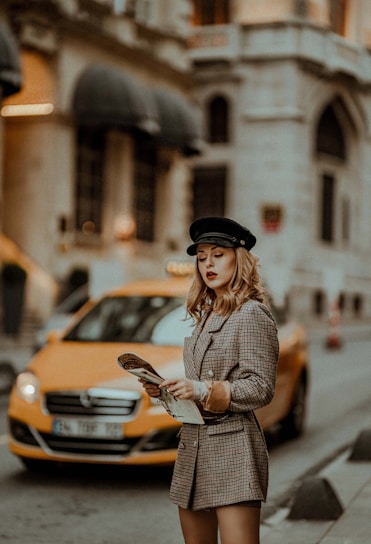 shallow focus photo of woman in gray coat
