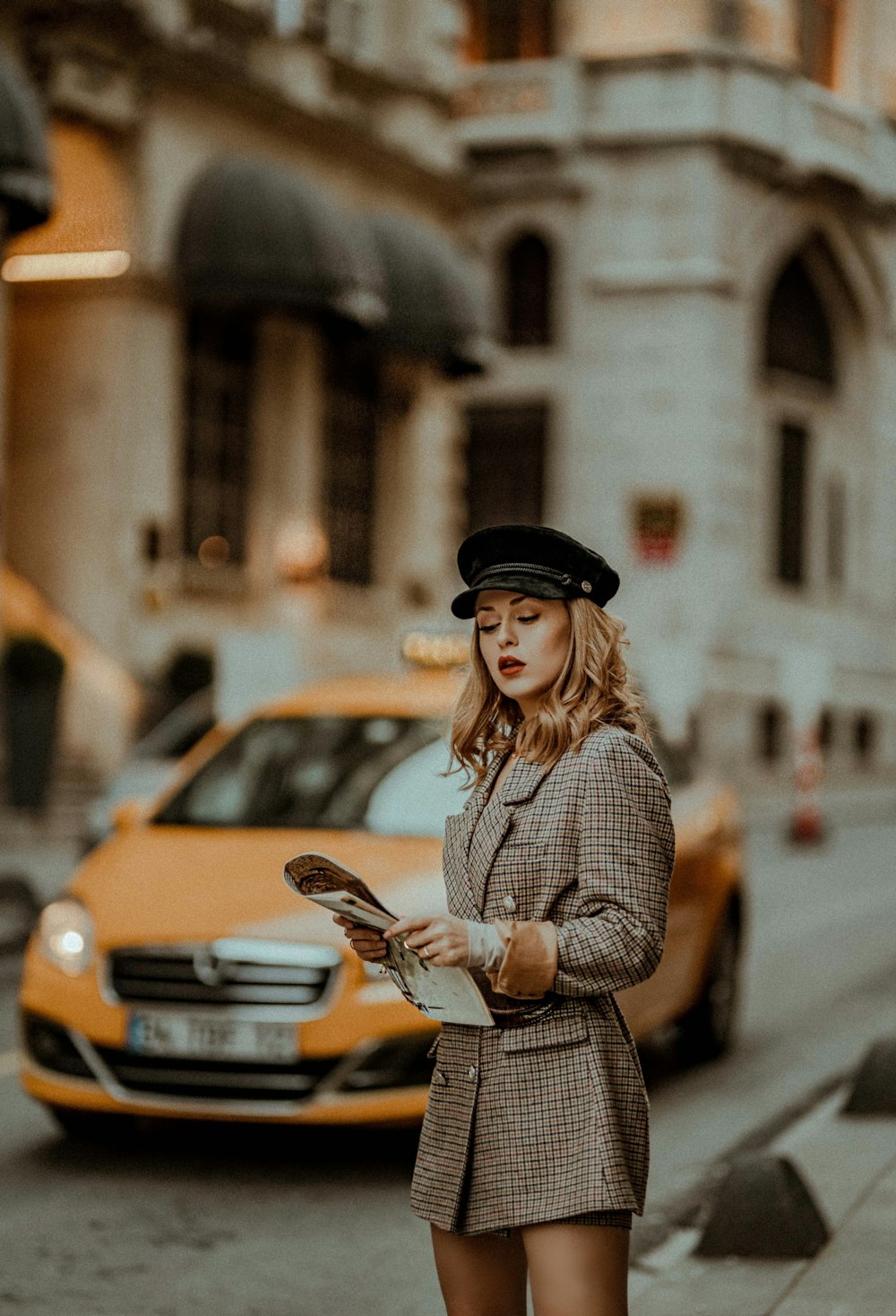 shallow focus photo of woman in gray coat