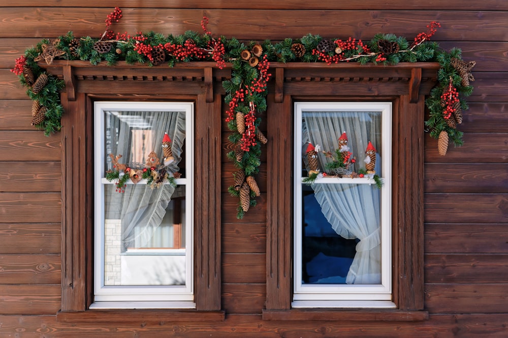 two white wooden framed clear glass windows
