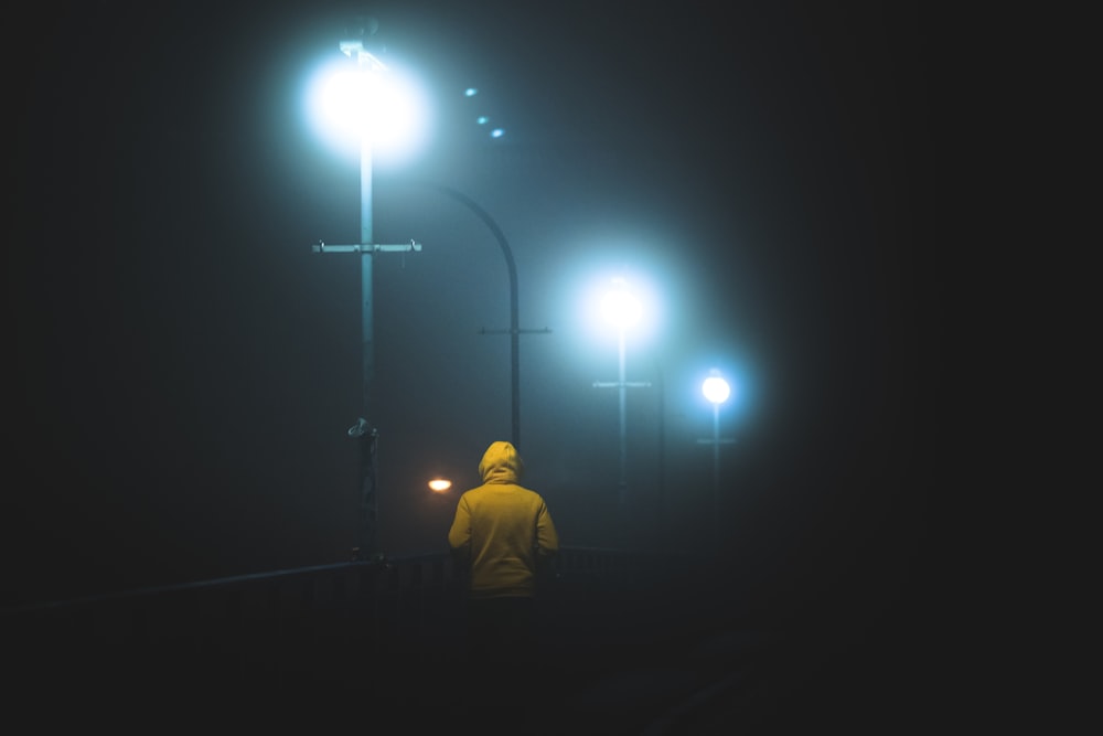 man in yellow hoodie