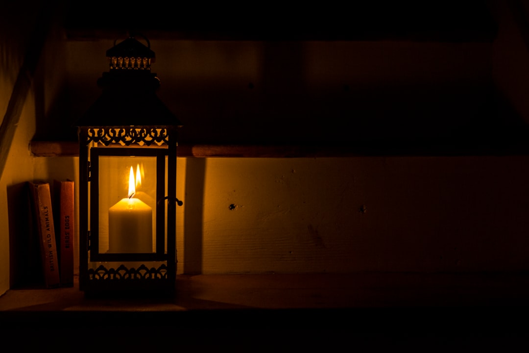lighted black candle lantern