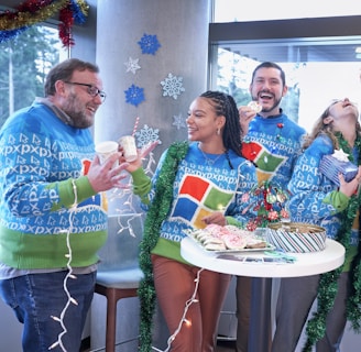 men and women wearing Windows sweater