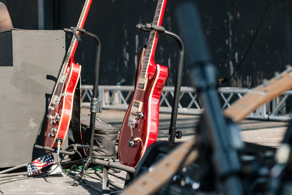 two red electric guitars